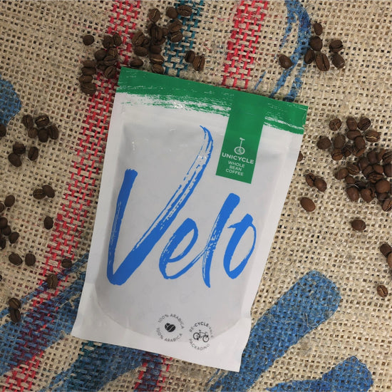 Blue Ayarza Vinoso 200g from Guatemala White Bag with Green strip acorss the top and Blue Velo Across the Bag - Velo Coffee Roasters