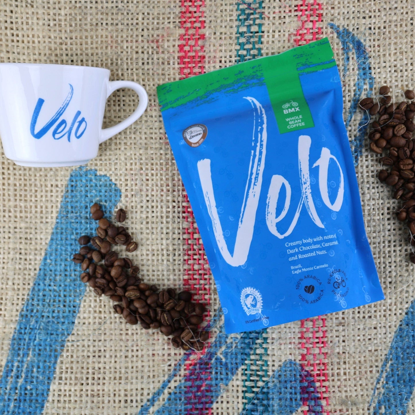 BMX 200g Brazil Coffee - Blue and Green Coffee Bag with White Velo Across the bag Whole Bean - Velo Coffee Roasters