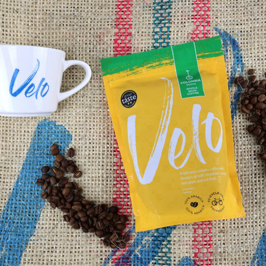 Load image into Gallery viewer, Dulima 200g Coffee from Colombia Coffee Bag Yellow with Green strip across top for Whole Bean - Velo Coffee Roasters
